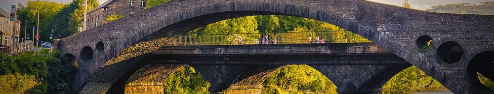 The Old Bridge (formerly New Bridge) in Pontypridd, south Wales, with the Victoria Bridge behind it